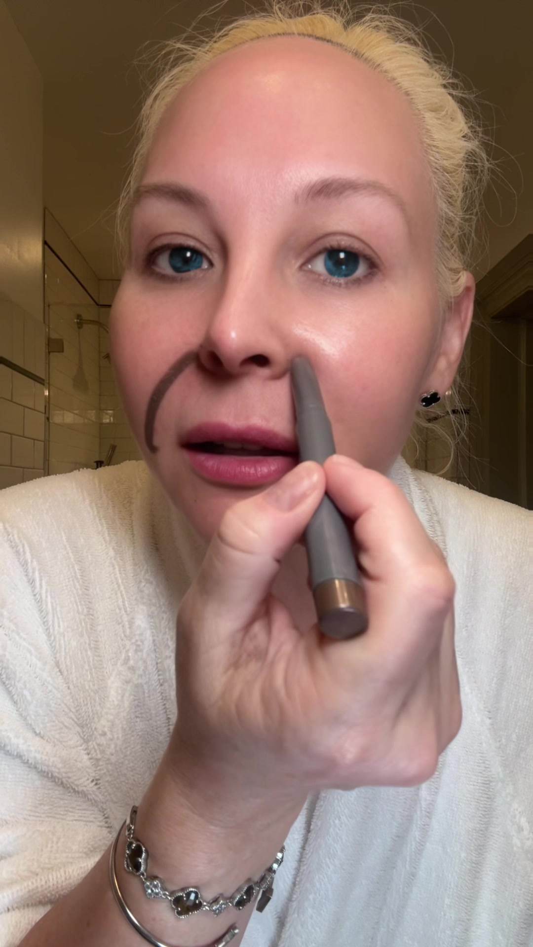 Jamielee applying SUNGBOON EDITOR EGF Eye Cream around her mouth